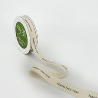 3/4 Inch Ivory Canvas Printed Ribbon with Woven Edge – 413-34-43 HAPPY NEW YEAR