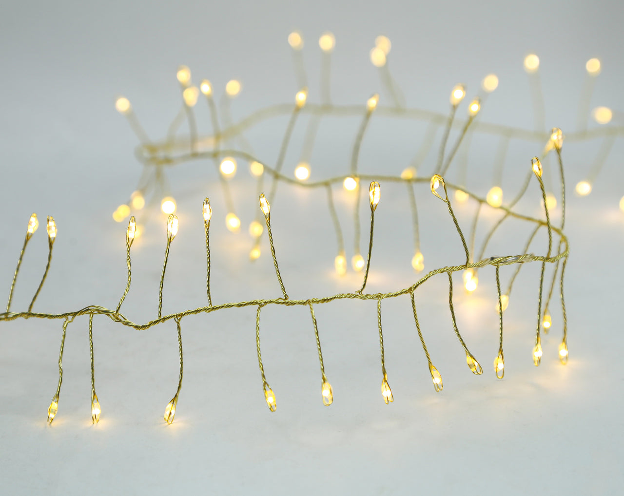 7.87' 240L Warm White Twinkle Micro LED Gold Wire Cluster Garland