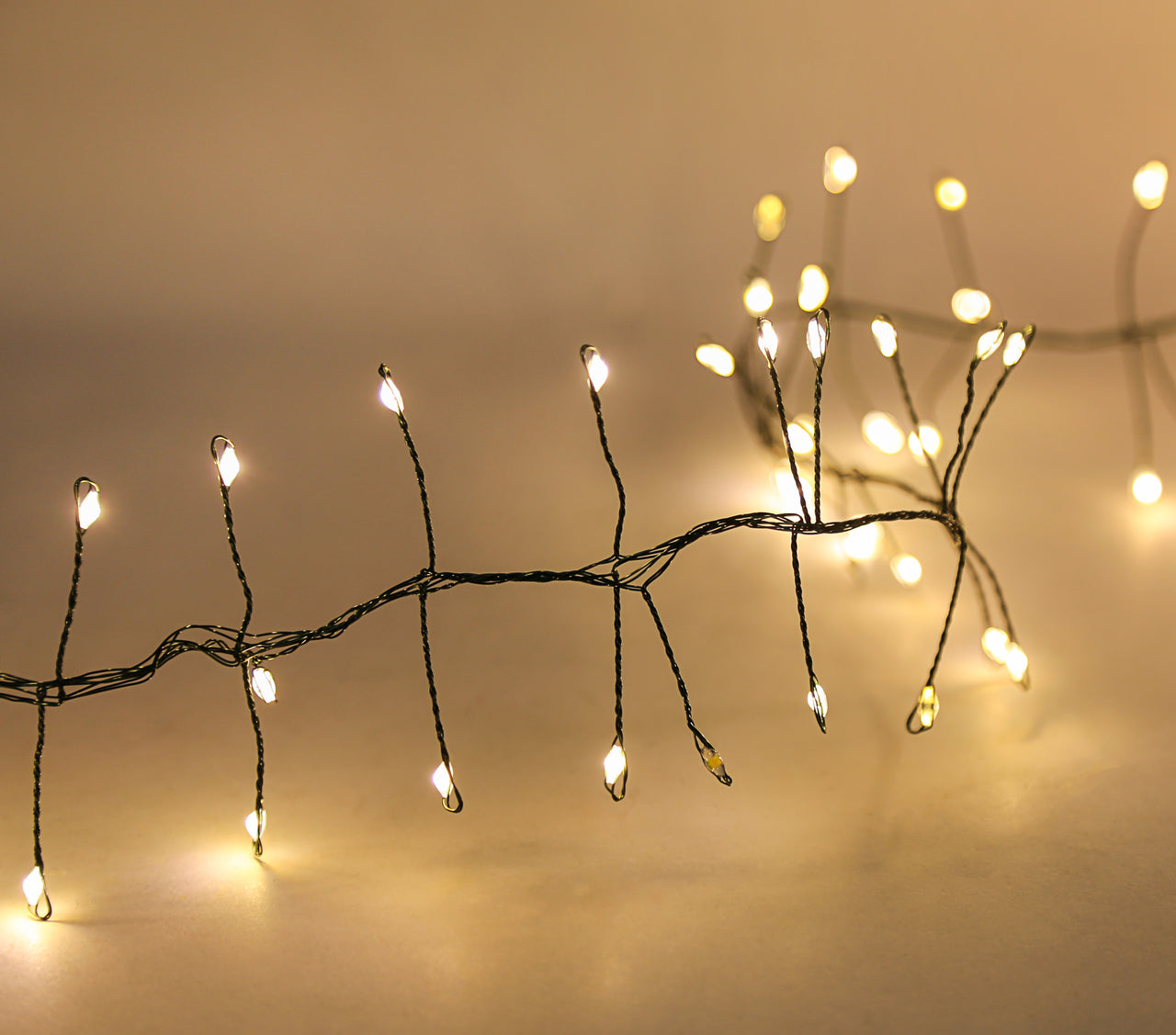 7.87' 240L Warm White Twinkle Micro LED Green Wire Cluster Garland