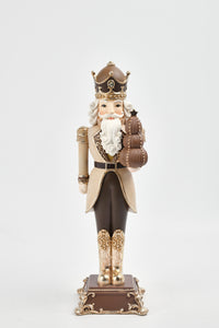 Sm. Nutcracker Holding Xmas Tree