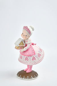 Gingerbread Mrs. Santa Claus With Gingerbread House In Hand