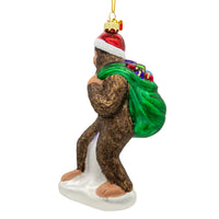 Noble Gems™ Glass Bigfoot With Sack Of Gifts Ornament