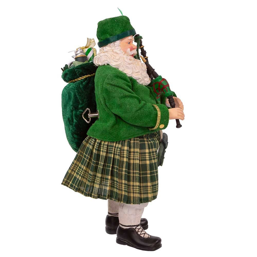 10.5" Fabriché™ Musical Irish Bagpiper Santa