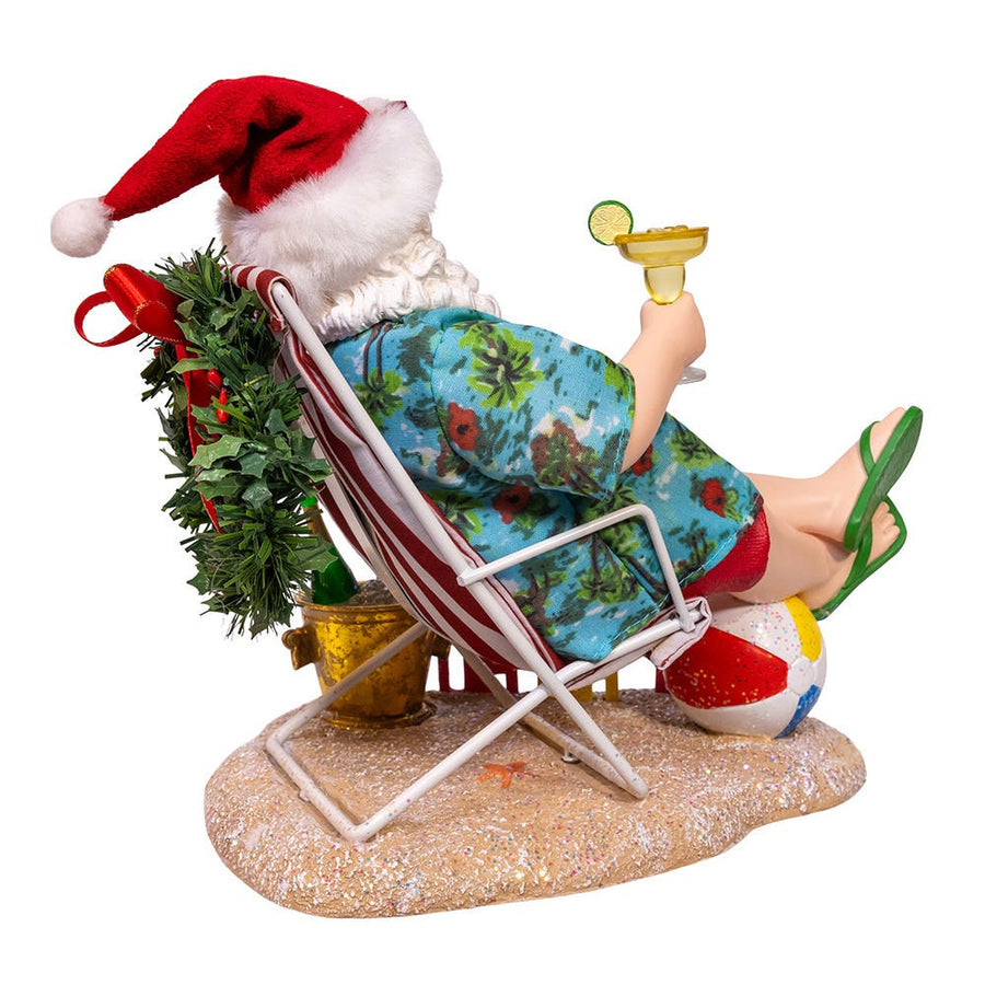 8.5“ Fabriché™ Santa Sitting On Beach Chair