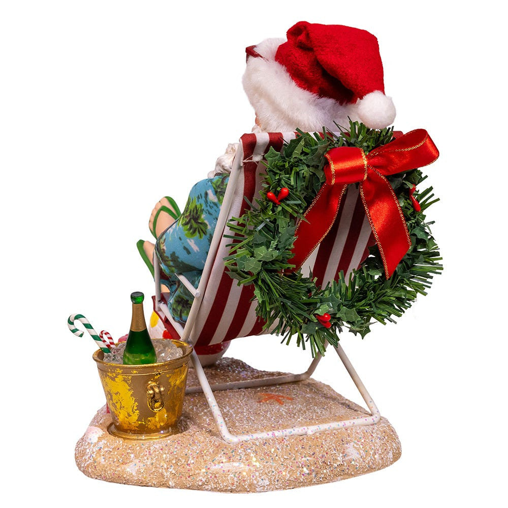 8.5“ Fabriché™ Santa Sitting On Beach Chair