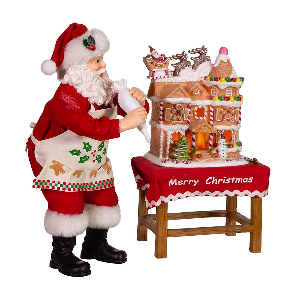 10.5" Fabriché™ Battery Operated Santa With Gingerbread Houses