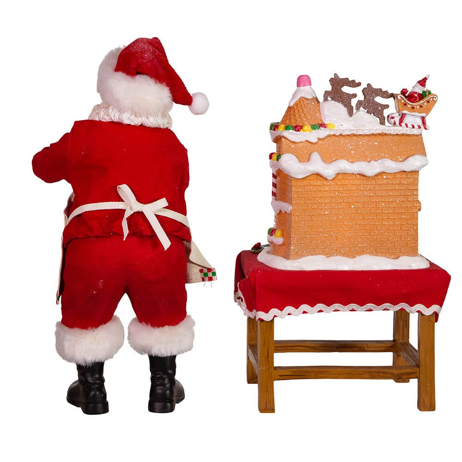 10.5" Fabriché™ Battery Operated Santa With Gingerbread Houses