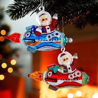 Noble Gems™ Glass Santa In Rocket Ship Ornament