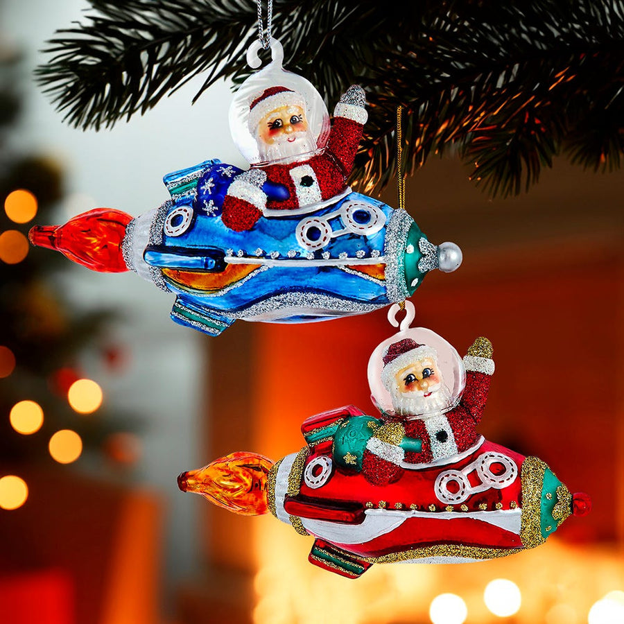 Noble Gems™ Glass Santa In Rocket Ship Ornament
