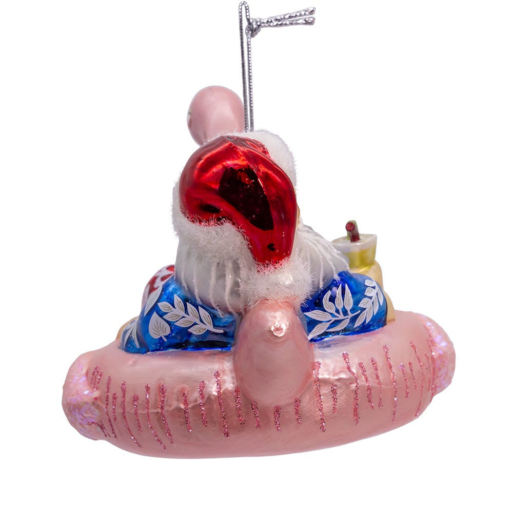 Noble Gems™ Glass Santa In Flamingo Pool Float Ornament