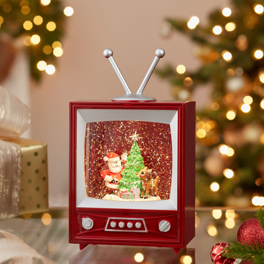 8.5" Rudolph The Red Nose Reindeer® and Santa Battery Operated LED Musical TV and Swirl Water Lantern